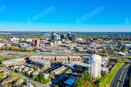 Preview: Aerial shot of Greensboro in the morning under a clear blue sky