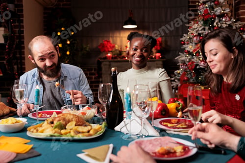 Preview: African american woman at xmas dinner