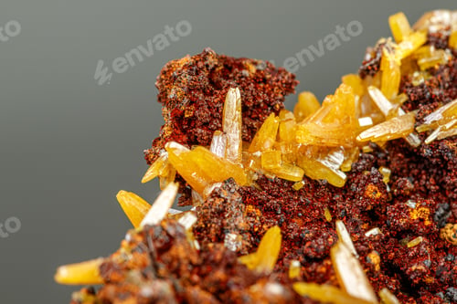Preview: macro mineral Wulfenite stone on a black background