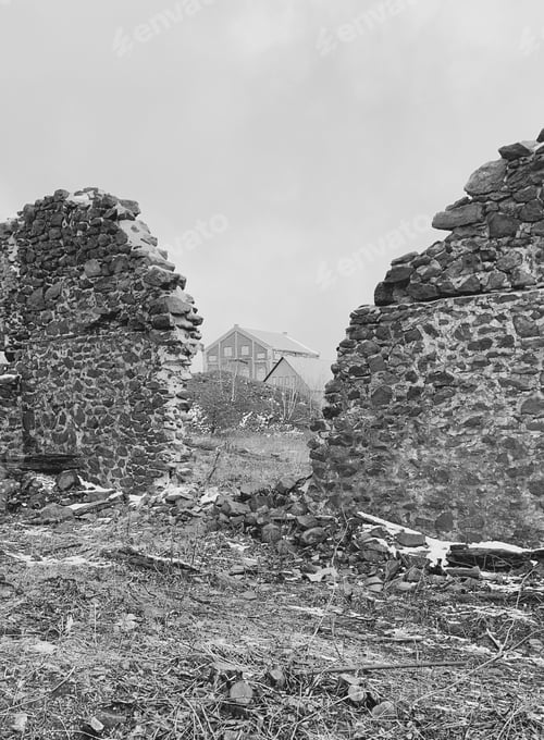 Preview: Vertical shot of left copper mine buildings with two half-destroyed stone walls in the foreground