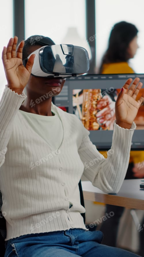 Preview: African video editor experiencing VR goggles