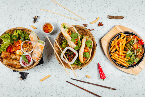 Preview: Delicious Vietnamese food including Pho ga, noodles, spring rolls on white background