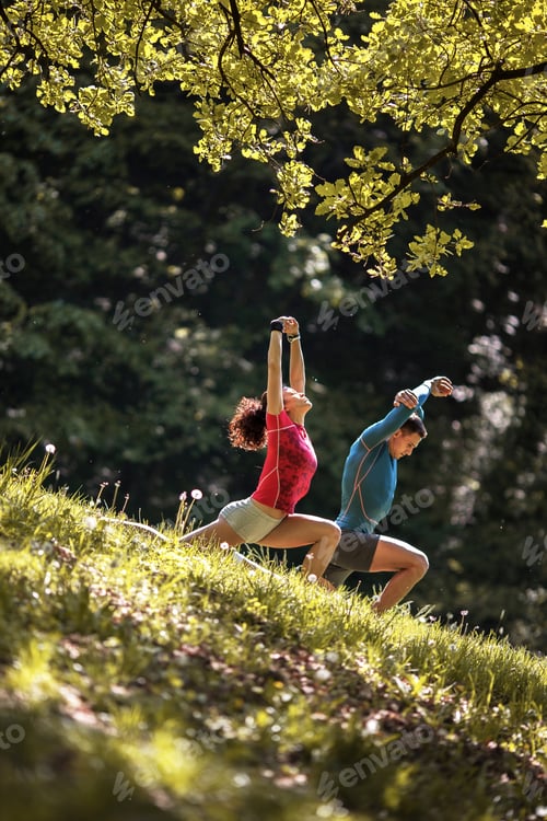 Preview: Man and Woman Exercising in a Green Field
