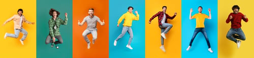 Preview: Set of positive multiethnic men jumping over colorful studio backgrounds