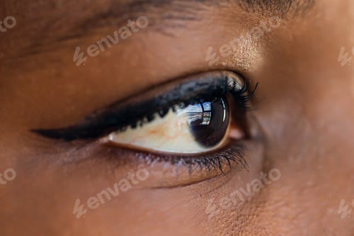 Preview: Close-up of make-up eye with long eyelashes of african american woman