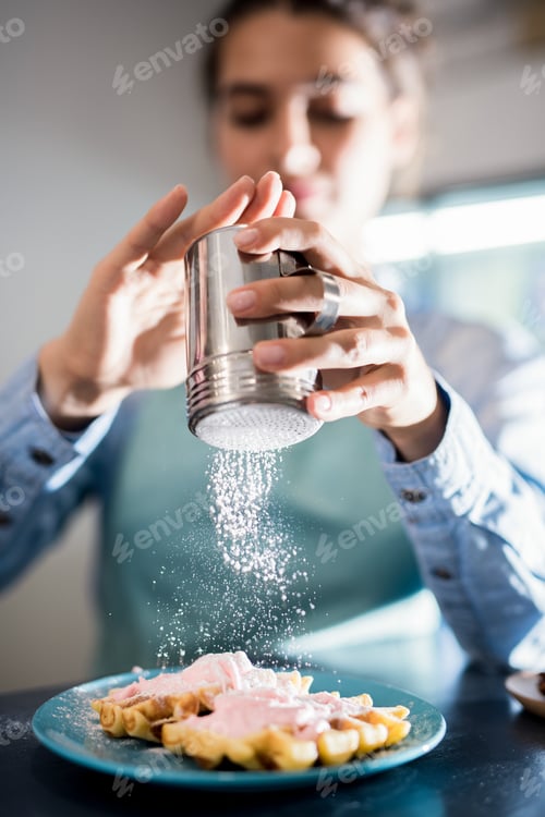 Preview: Powdered Sugar Pouring over Sweet Waffles