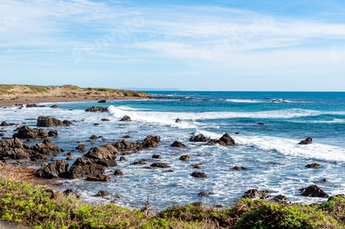 Preview: Rugged shoreline with crashing waves at Piedras Blancas in San Simeon, California