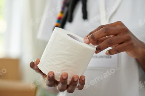 Preview: Volunteer Holding Toilet Paper