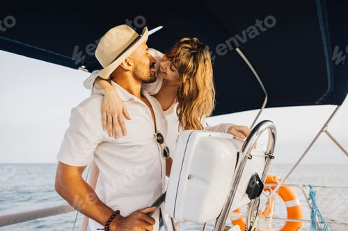 Preview: Romantic couple enjoying a sailing adventure on a yacht