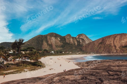 Preview: Beautiful landscape view of the beach in Rio de Janeiro with awesome rock formation and mountains