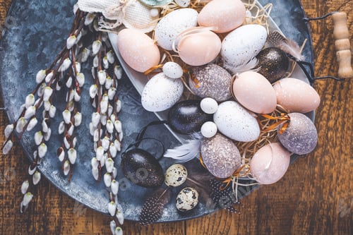 Preview: Colorful Easter eggs in basket and pussy willow branches