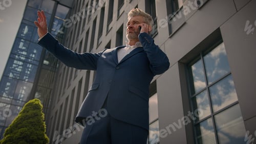 Preview: Bottom view Caucasian senior man standing in city downtown near office company building background