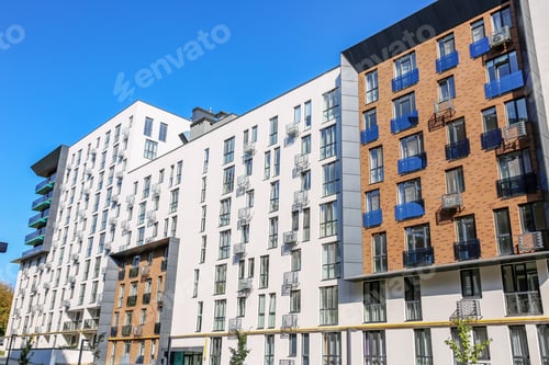 Preview: Contemporary multi-story apartment building with balconies
