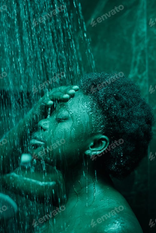 Preview: Woman standing under the shower
