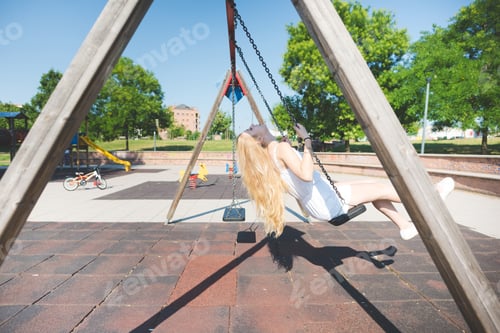 Preview: young blonde woman in the city