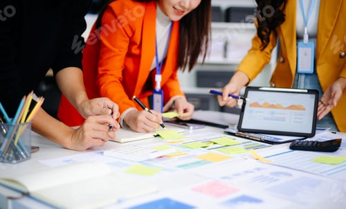 Preview: Business People Talking Discussing with financial document data charts and graphs Team business