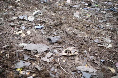 Preview: Garbage dump at waste processing site. Environment pollution concept. Selective focus