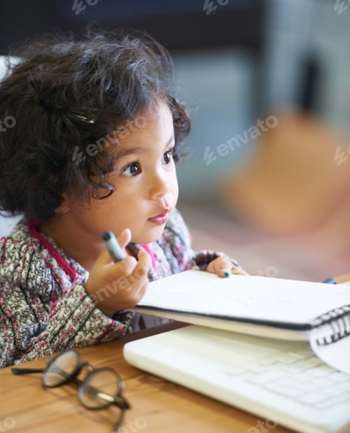 Preview: Learning as she grows. Shot of a cute little girl at home.