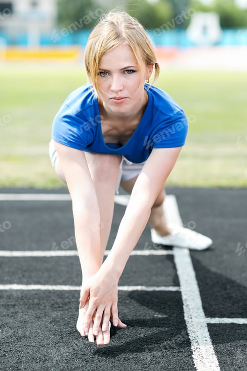 Preview: Woman Doing Core Workout At A Stadium