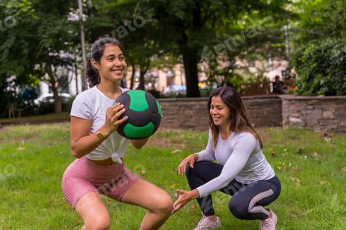 Preview: Latin girl doing sports in a green park, lifestyle a healthy life, attentive teacher with