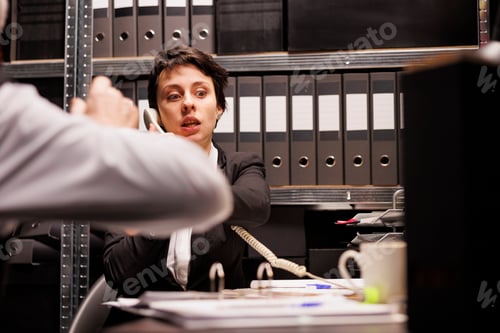 Preview: Woman police officer talking with remote inspector