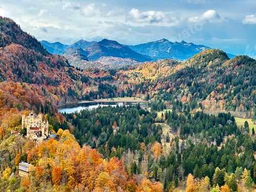 Preview: Aerial View To Autumn Landscape With Lake, Forest, Mountains, Castle And Tiny Houses