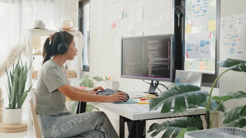 Preview: lady IT development programmer listen music enjoy work type on keyboard coding programming.