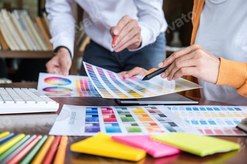 Preview: Two colleague creative graphic designer working on color selection and color swatches