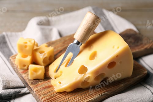 Vista previa: Tasty fresh cheese with fork on wooden board, closeup