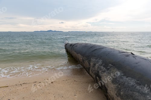 Preview: Water pipe going into the Atlantic ocean. Sea water intake pipe at the beach