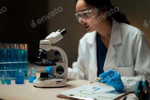 Preview: Scientist Analyzing Data in a Lab with Microscope