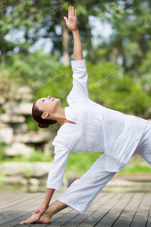Preview: Young woman practicing yoga