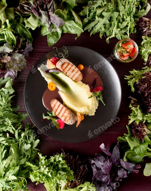 Preview: Grilled chicken with mashed potatoes sauce and lettuce mix top view