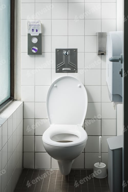 Preview: Vertical shot of a bathroom with white walls
