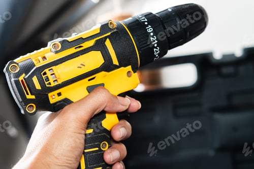 Preview: Close-up of a Yellow and Black Cordless Drill