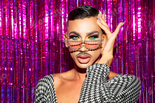 Preview: portrait of drag queen diva in glitter night