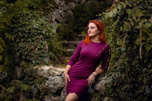 Preview: Beautiful young woman enjoys the autumn warmth