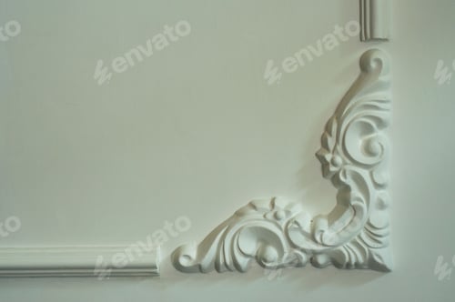 Preview: White decorative ornament displayed against a wall in a room