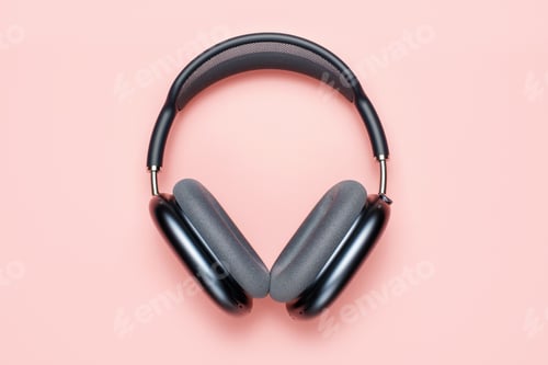 Preview: Seoul - 19.12.2024: AirPods Max on pink background close-up, top view.