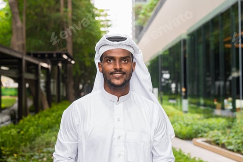 Preview: Portrait of African Muslim man wearing religious clothing an scarf outdoors
