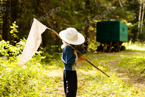 Preview: Boy in woods with butterfly net, Sarsy village, Sverdlovsk Region, Russia