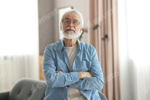 Preview: Portrait of happy grandpa with glasses indoors
