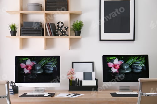 Preview: Desktop Computer Workspace With Monitors and Decorations