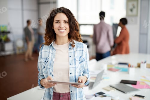 Contemporary Creative Woman in Office