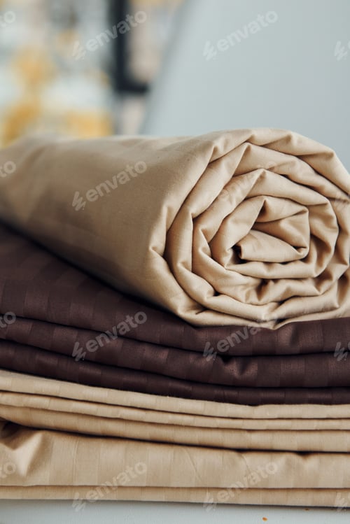 Preview: Close up view of new bedroom clothes that lying down