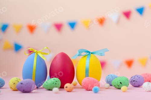 Preview: Composition with colorful painted eggs on peach background. Easter background. Happy Easter.