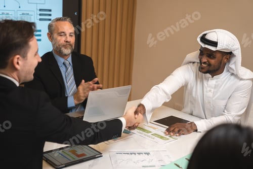 Preview: Emirate man having business deal agreements with partnership team, Arabian manager making handshake