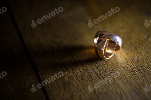Preview: Golden wedding rings for newlyweds on their wedding day