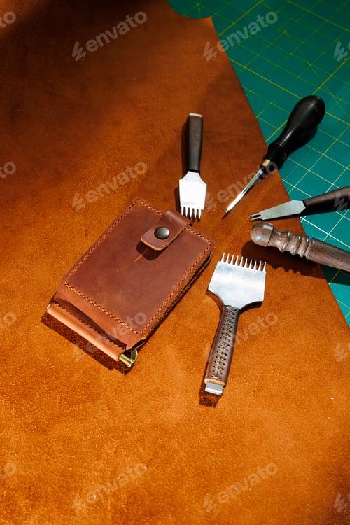Preview: Production of handicrafts from genuine leather. Tools for making leather goods and pieces of brown