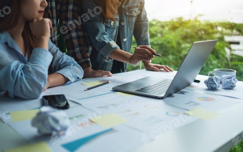 Preview: Group of businessman working and using laptop computer in the office
